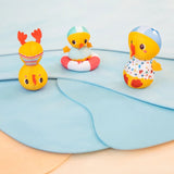 3 canards au bord de l'eau