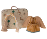Fairy clothes in suitcase - little sister