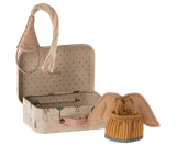 Fairy clothes in suitcase - little sister